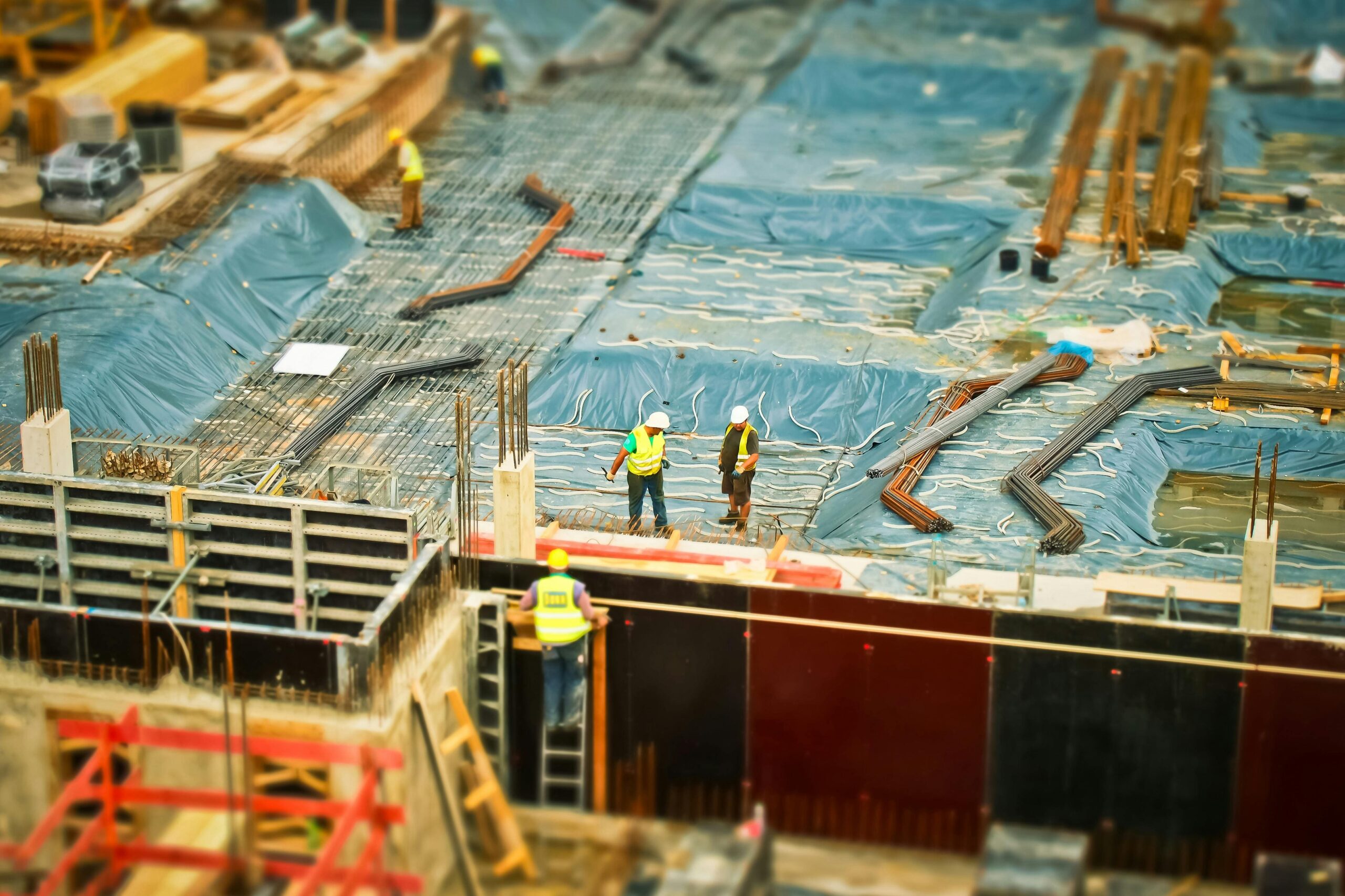 Two business partners shaking hands over a transition agreement.